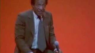Bill Cosby makes funny faces.