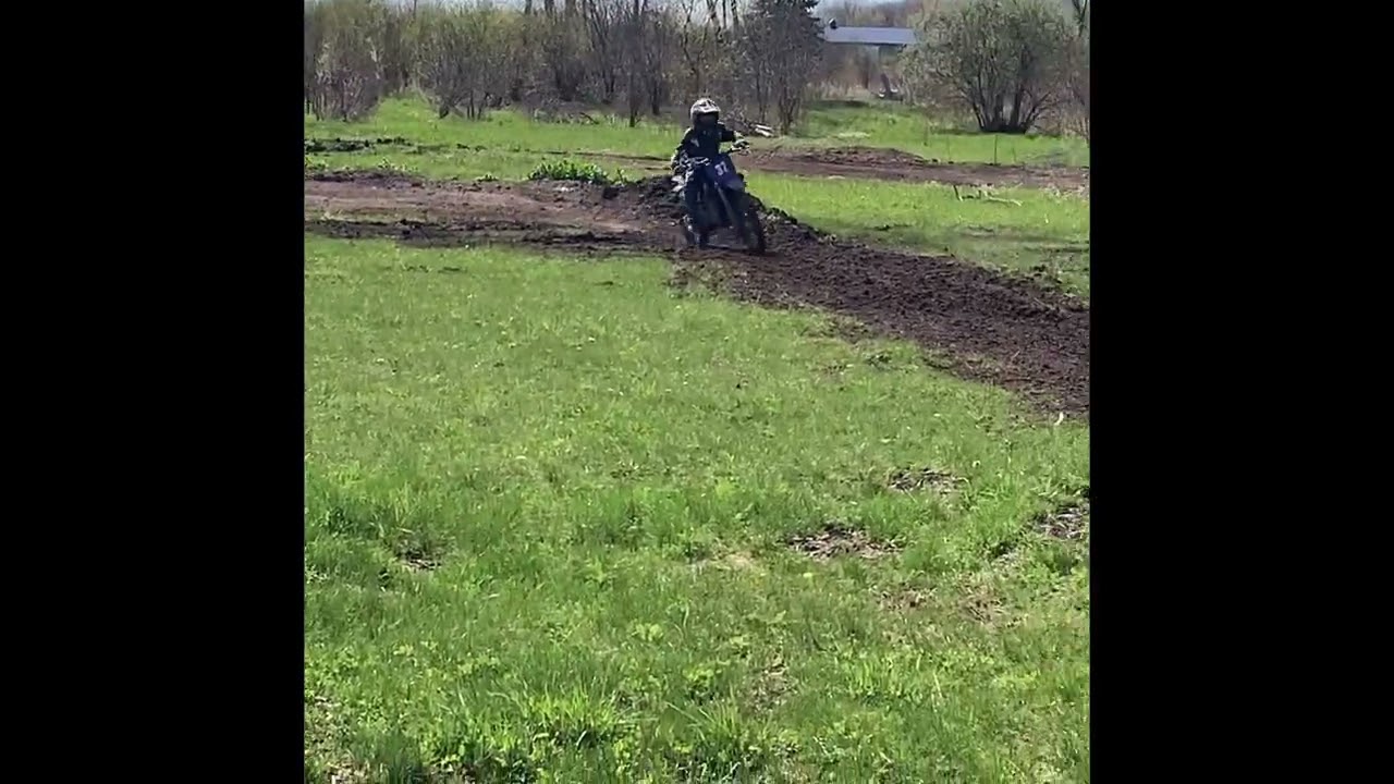 My 9 year old son jumping over me on his dirt bike on a private motocross track.