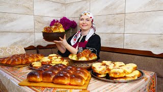 She prepared traditional Ukrainian pies "BUHTYKI" in the oven. Pies with cheese, strawberries