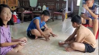 vui cùng những viên đá sỏi chơi chắt trở về tuổi thơ