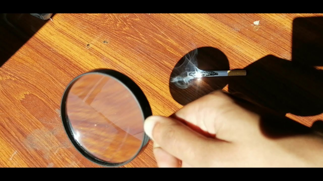 How to burn a sigret with magnifying glass YouTube