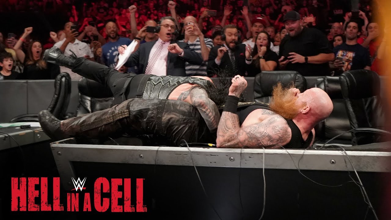 Roman Reigns Spears Erick Rowan Through The Announce Table Wwe