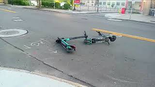 Two Veo 🛴 Scooters Left in the Middle of East Avenue in Rochester, New York, July 4th, 2023