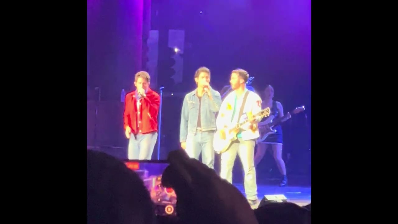 Jonas brothers performing only human in Bristow VA 