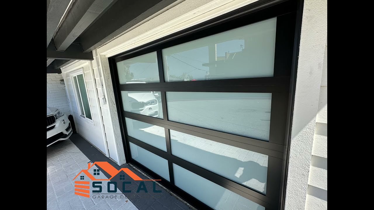 New Full-View Glass Garage Door Installation In Laguna Beach, CA | SoCal Garage Door Repair Inc.