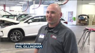 Auto body shops work overtime to repair cars with hail damage