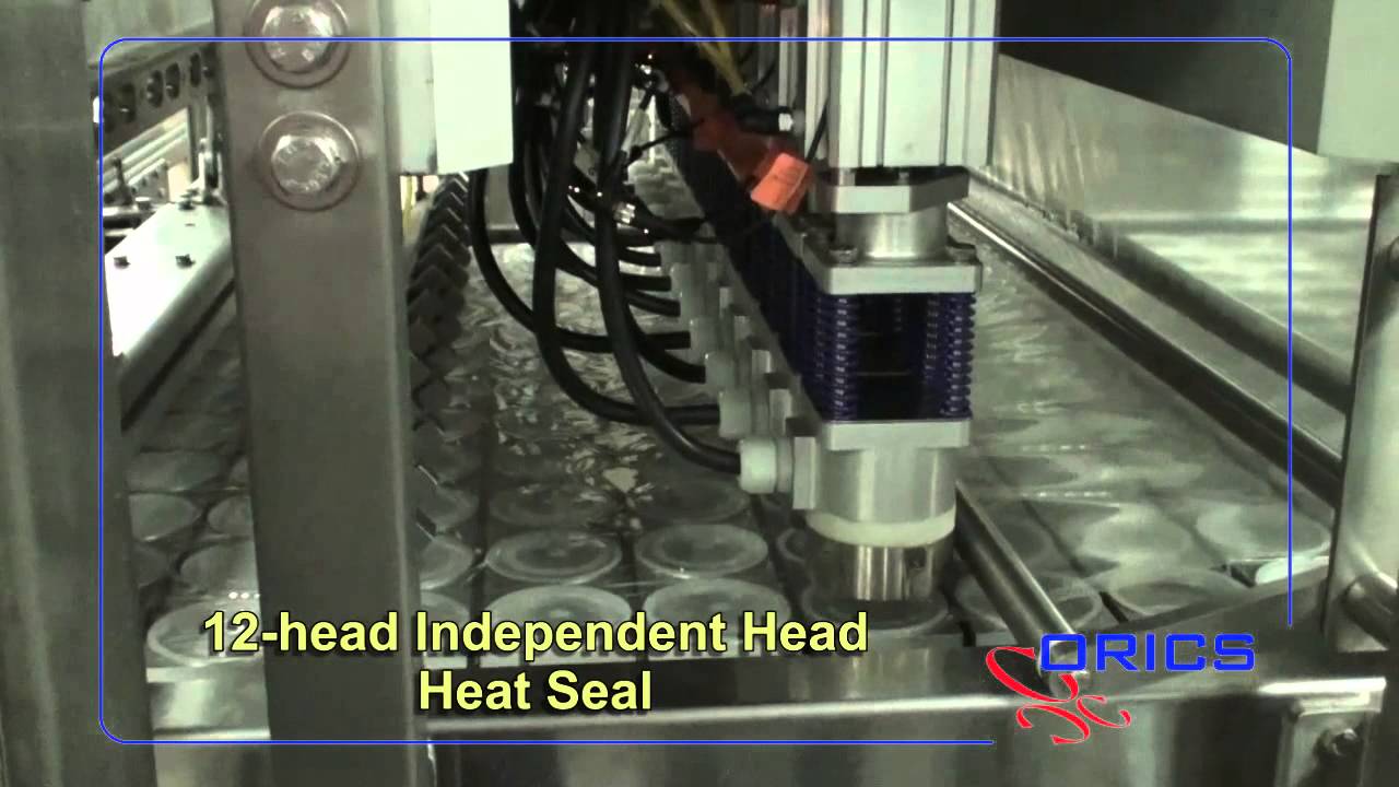 ORICS Juice Cup filling and sealing machine.  S-50 1x12  360 cups per minute