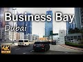 Business bay dubai with impressive skyscrapers and enthralling entertainment  dubai uae  4k