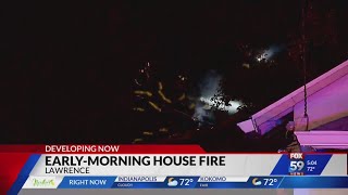 Crews respond to house fire in Lawrence