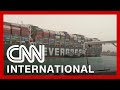 Stuck ship shuts down Suez Canal traffic
