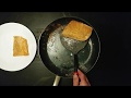 COOKING COCONUT POWDER CRUSTED SALMON on BLUE DIAMOND PAN