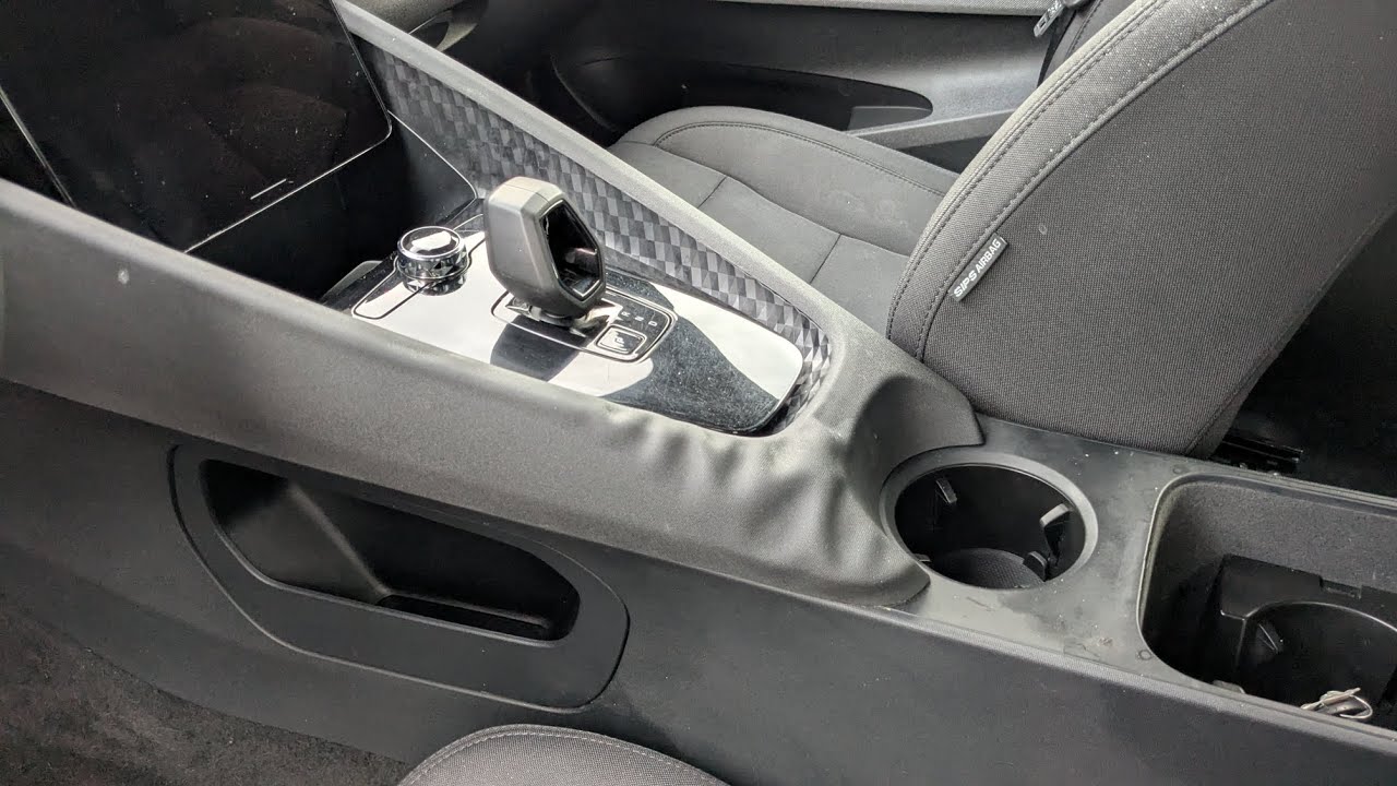 Снятие обивки центральной консоли Polestar 2022