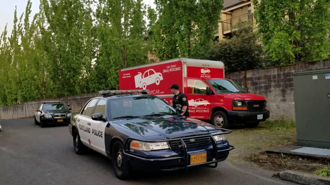 cop uses cop car to push back cop watchers YouTube