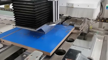 SKH 612HTHUAHUA ATC 6 sided CNC drilling machine  working on the production workshop