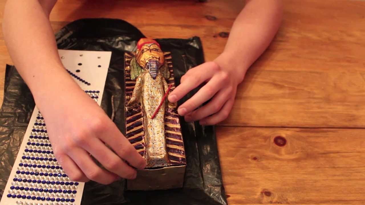 How can one build an ancient Egyptian mummy and tomb for a school project?