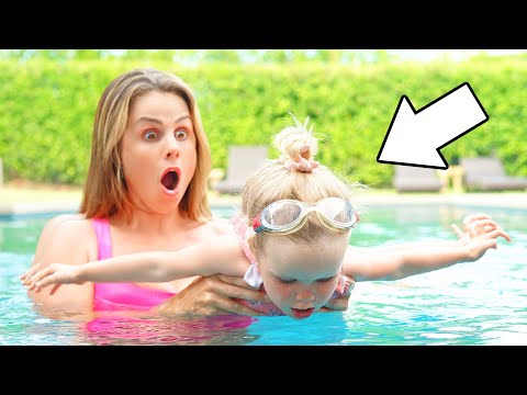 Teaching our 2 YR OLD BABY to SWIM! | Family Fizz