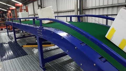 Mezzanine Floor Inclined Belt Conveyor - Bidirectional Belt- Orange Conveyor Systems - 9940647200