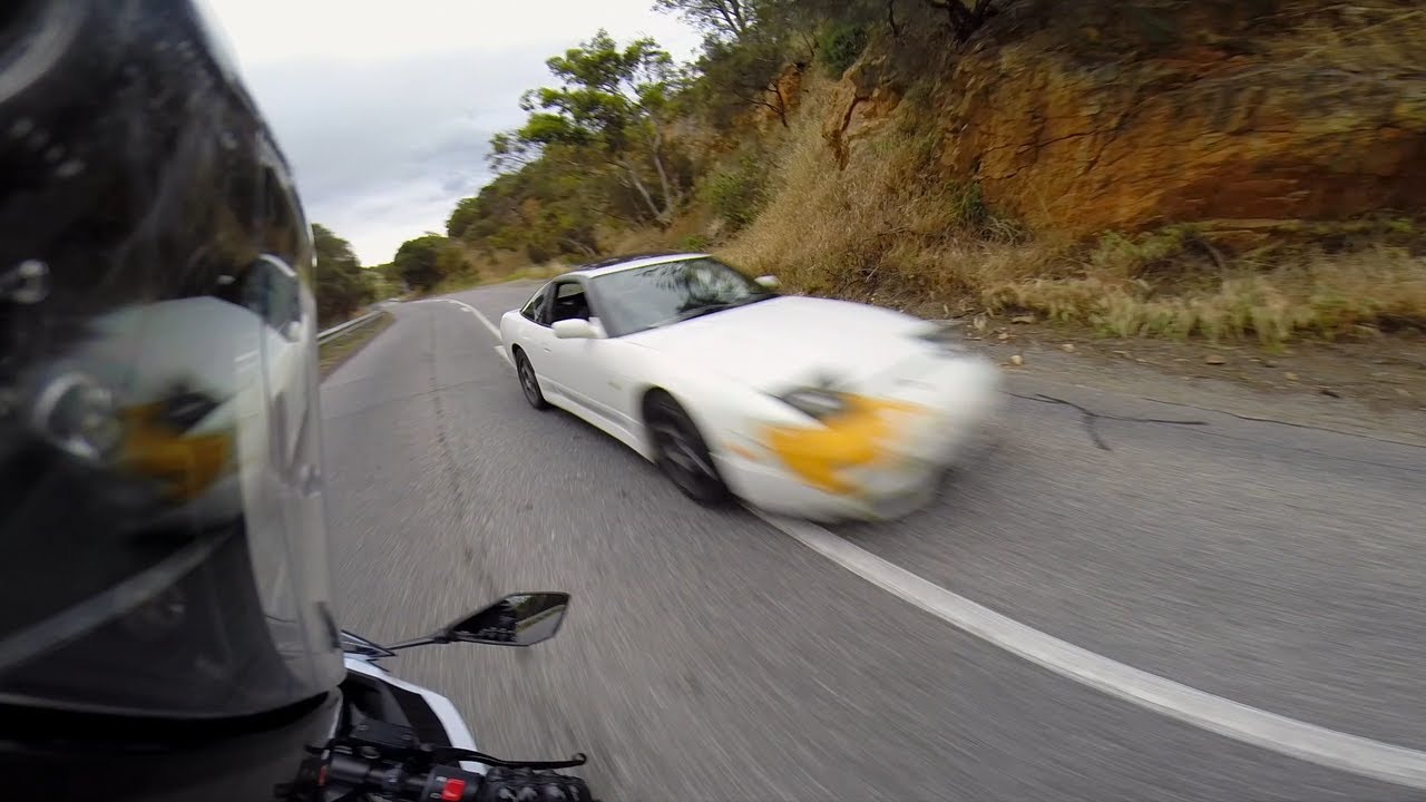 Almost hit by a car on the wrong side of the road - YouTube