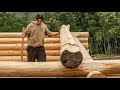 Lifting heavy logs on my off grid log cabin  building walls  cooking  ep13