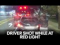 Driver shot after passenger in another car opens fire while stopped at red light in philly