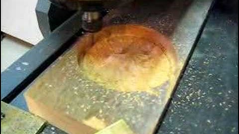 CNC routing a 3D wood coin on two sides by Intelicam