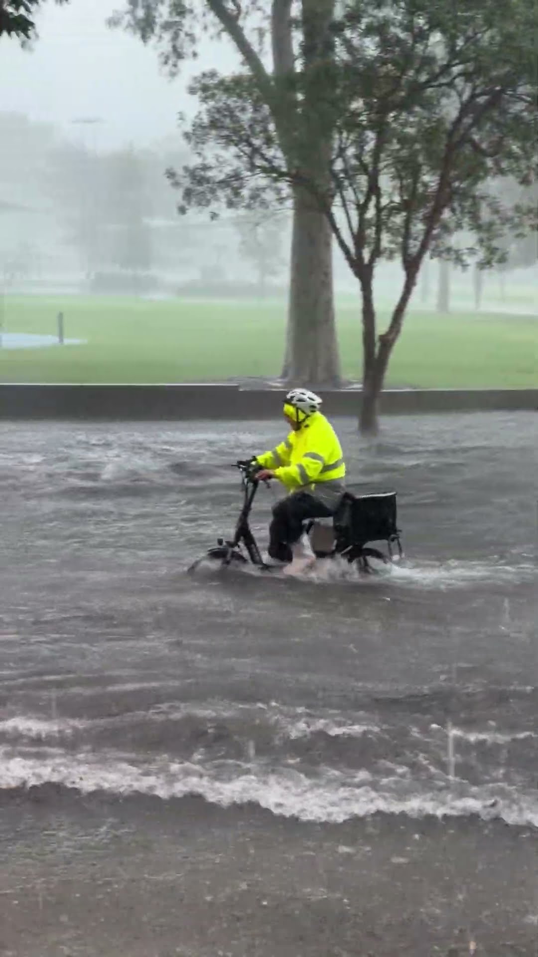 Bicycle Courier Rides Through Flooded to Street to Make Delivery || ViralHog