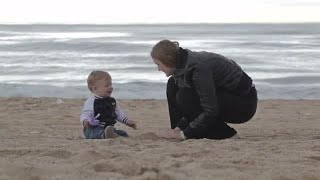 Mother And Son On Beach Stock Video