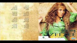 زيزي في أغنية حلم ولا علم من ألبوم وعد عليا 2009