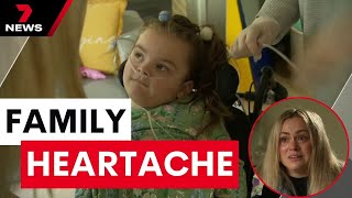 Little girl's heartbreaking plea for her sister's life after NDIS cut her care | 7 News Australia