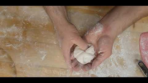 Shape kaiser rolls by hand