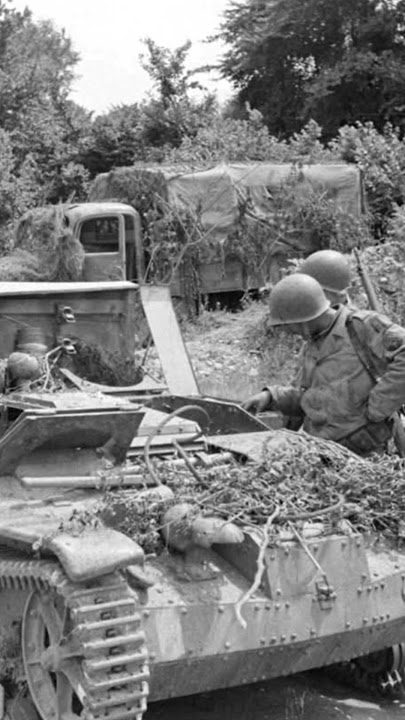 US Soldiers inspect a German modified Renault UE Chenilette tankette near Cherbourg, #shorts #ww2