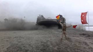 Navy Hovercraft Taking off from Beach