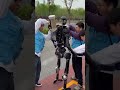 Robot pauses during a half-marathon for a quick technical check up