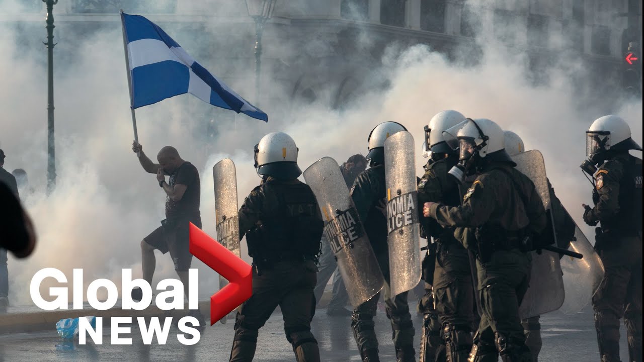 Greek police clash with protesters at rally against COVID-19 vaccinations in Athens