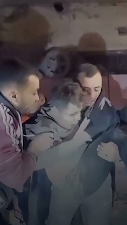 Young Gazan pulled from wreckage after Israeli strike