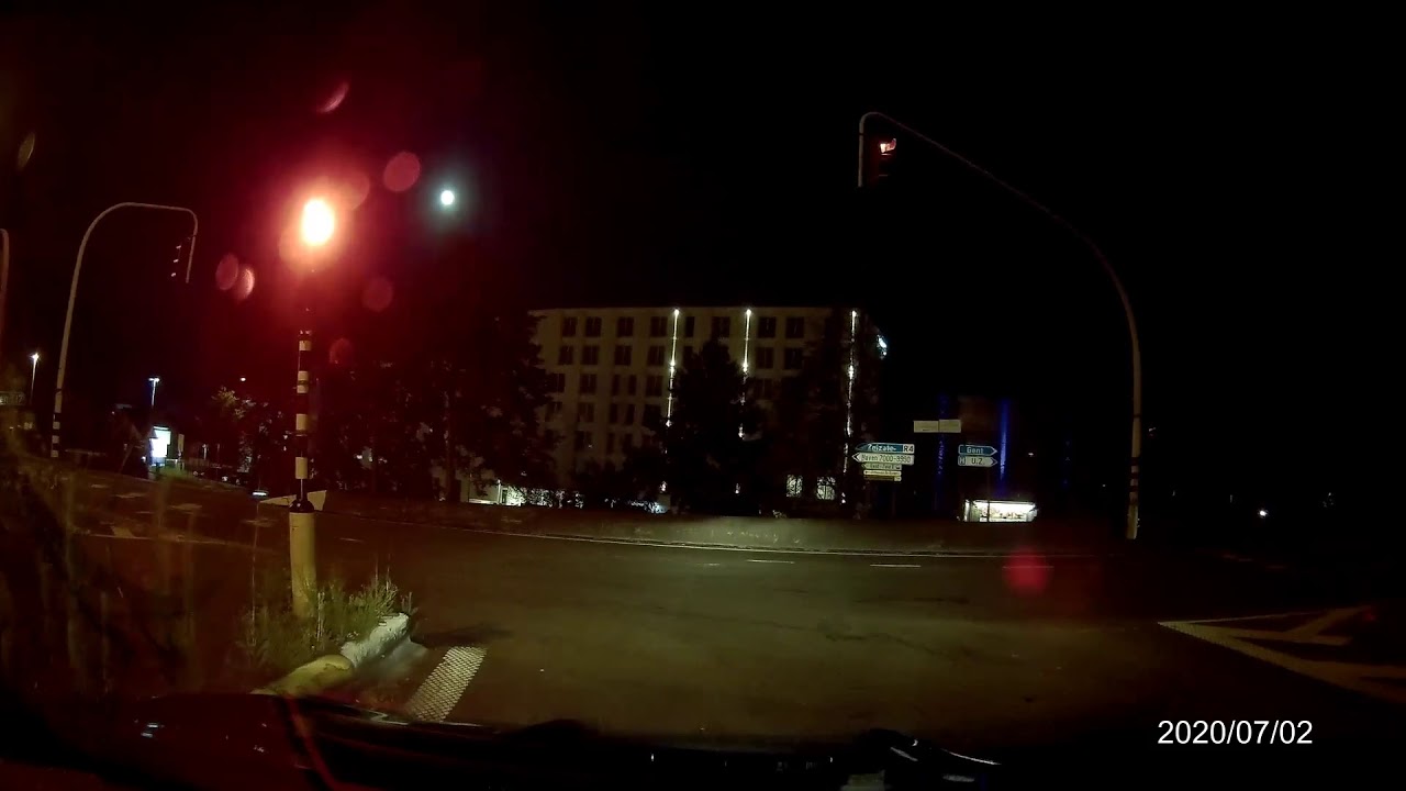 Driver ignores red light & almost causes accident - YouTube