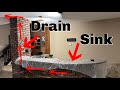 Making a sink drain up through the ceiling
