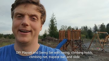 DIY Playset and Swing Set with swing, climbing holds, climbing net, trapeze bar, and slide.