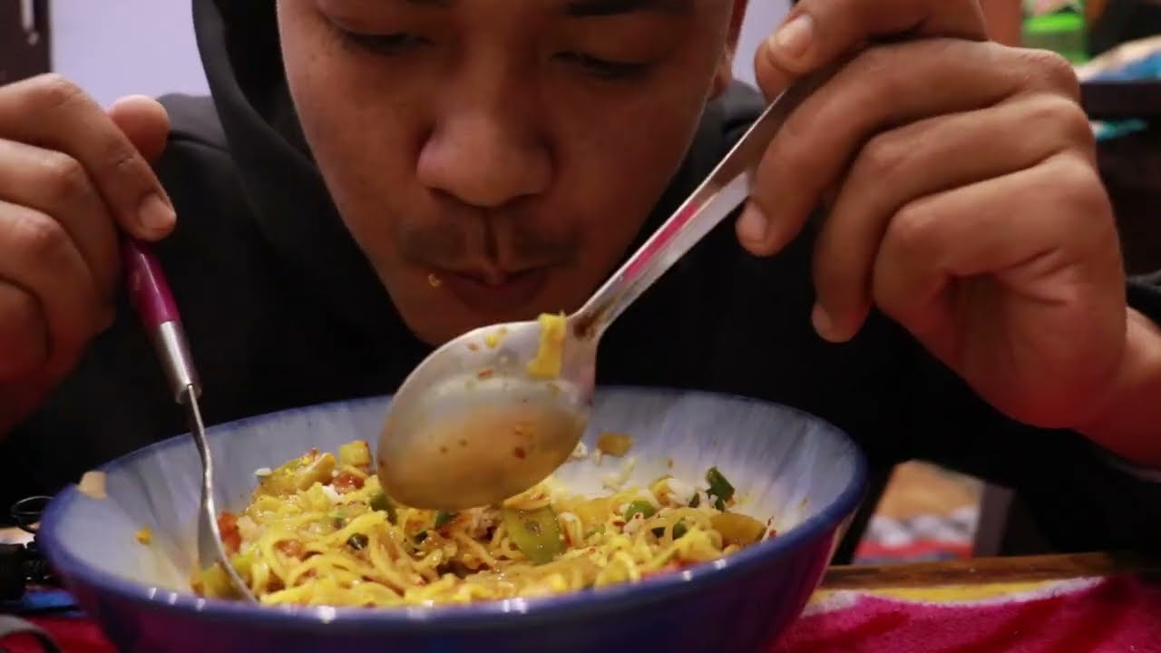 eating noodles | Dinesh Thapa Magar