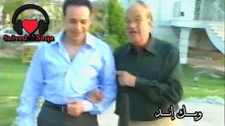 مصطفى قمر والراحل حسن حسني - من كواليس فيلم قلب جريء 2002