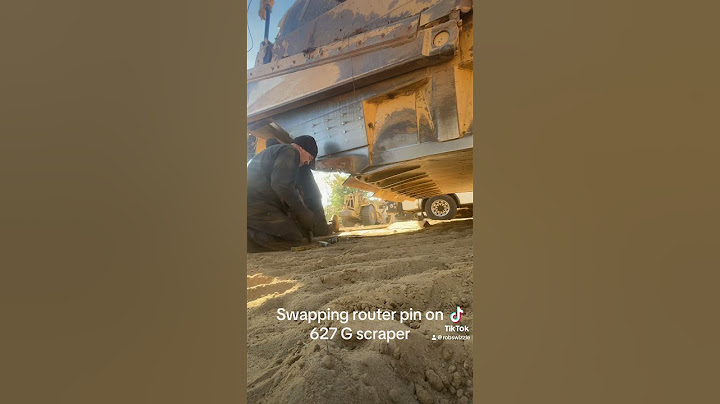 Swapping router pin on 627 G scraper #heavyequipment #mechanic #caterpillar