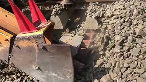 Through formation treatment using Geo grid and Geo textile by ballast cleaning machine