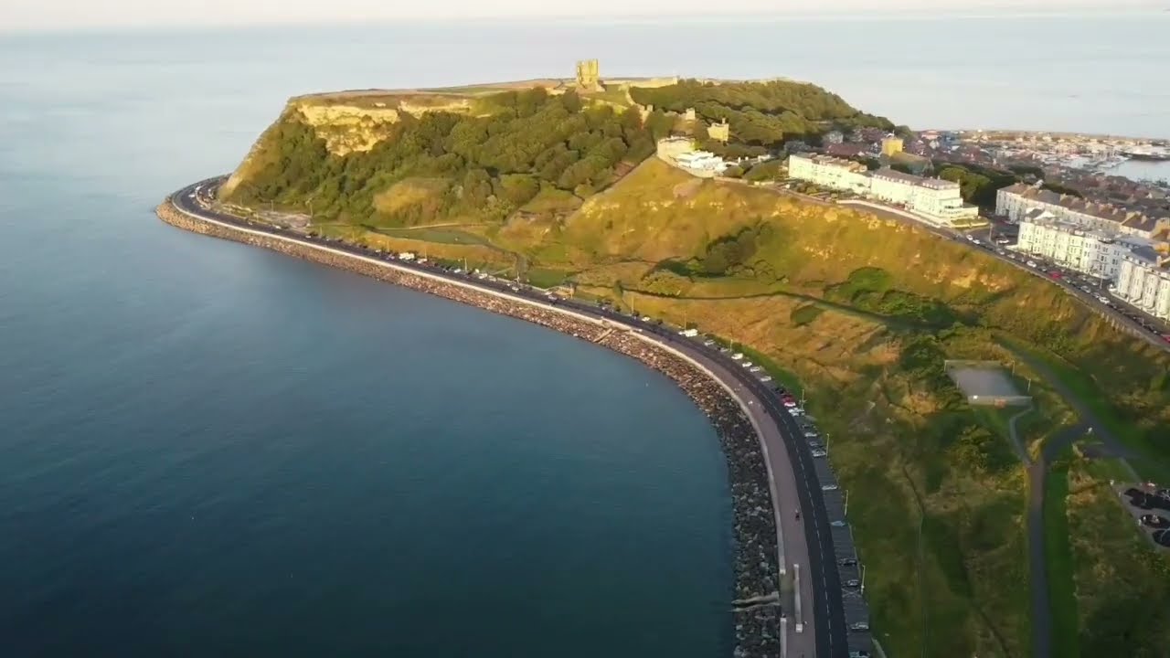 Low flying Aerial Footage Scarborough Castle and Promenádě England HD