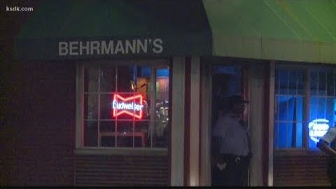 Man with assault rifle, orders bar patrons to the ground, robs everyone