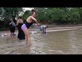 Washing clothes in the river