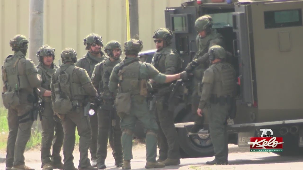 Police work to get man accused of firing gun to surrender - YouTube
