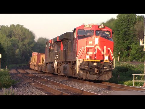 Two ES44DC Gevos Lead a Long Stack Train CN 120 at Ile Perrot, Quebec