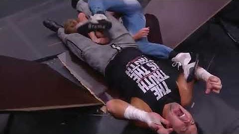 Matt Hardy leg drops Orange Cassidy off ladder thru table