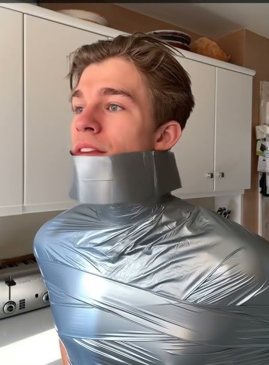 Magic silver duct tape on Alex Sampson