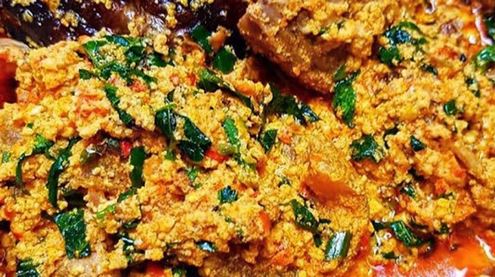 HOW TO COOK THE BEST EGUSI SOUP USING VEGETABLE AND UZIZA LEAF || MELON SOUP RECIPES #vlog